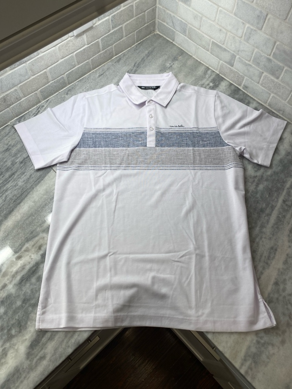 Travis Mathew White Polo with Blue & Gray Chest Stripes